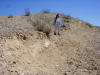 Person on Landers earthquake scarp